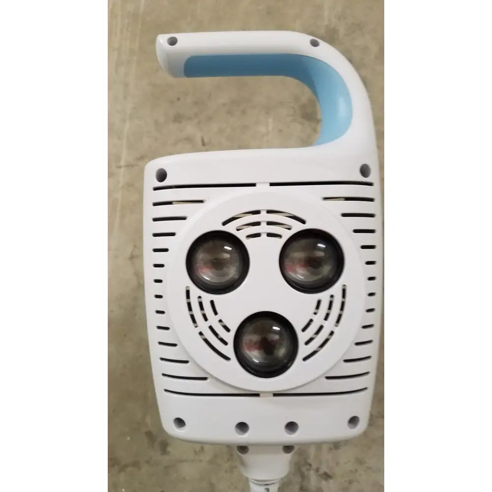 Welch allyn GS 600 exam light handheld device in white and light blue with three circular lenses and rolling stand