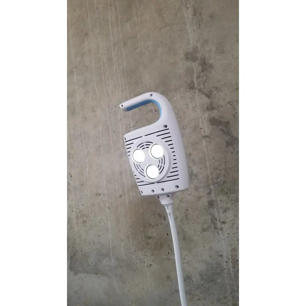 Welch allyn GS 600 exam light with rolling stand featuring white handheld light with three circular LED bulbs and blue handle