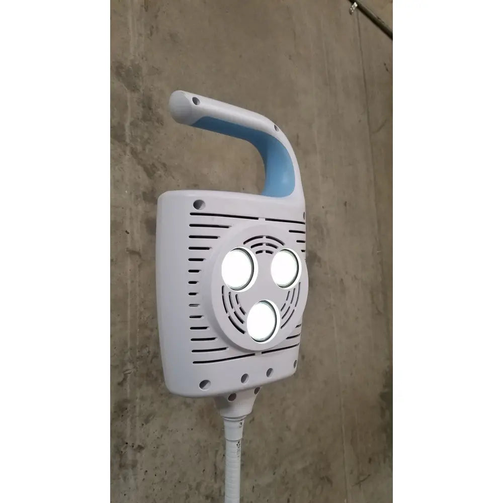 Welch allyn gs 600 exam light handheld in white and light blue with three led lights and rolling stand for medical use