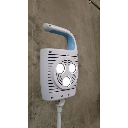 Welch allyn gs 600 exam light handheld in white and light blue with three led lights and rolling stand for medical use