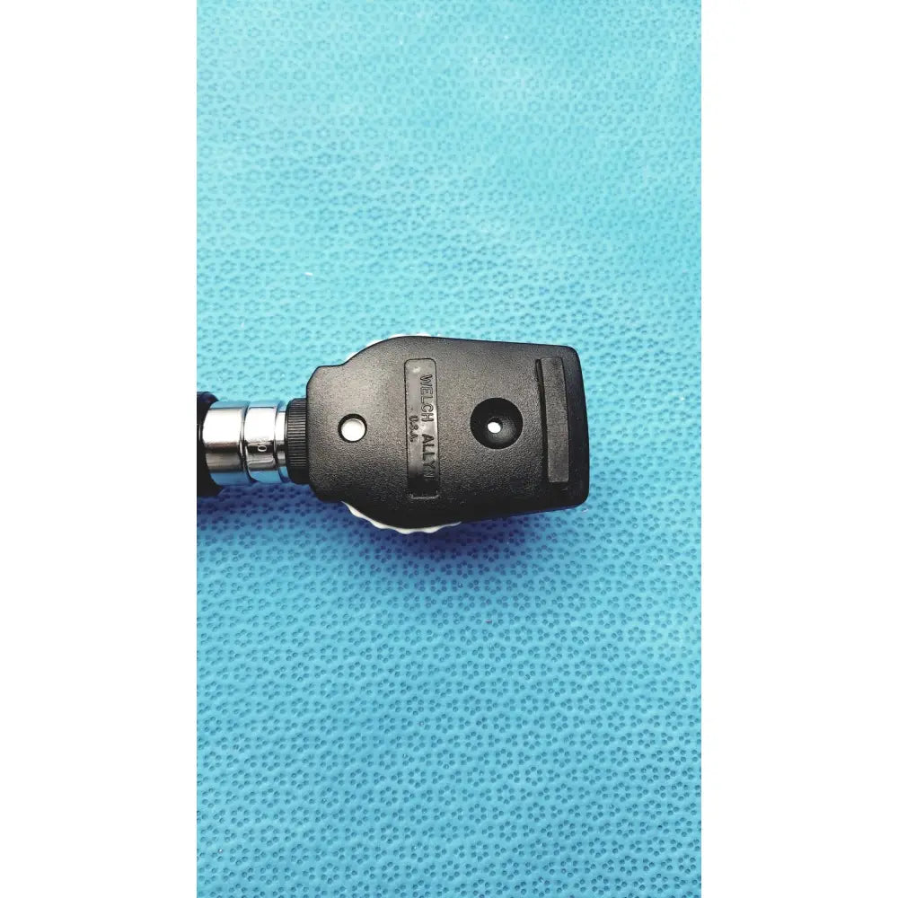 Black plastic and metal welch allyn ophthalmoscope head with textured grip for wall transformer reuse medical use