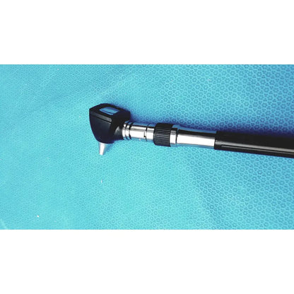 Welch allyn wall transformer ophthalmoscope otoscope with black and silver textured grip and angled tip otoscope