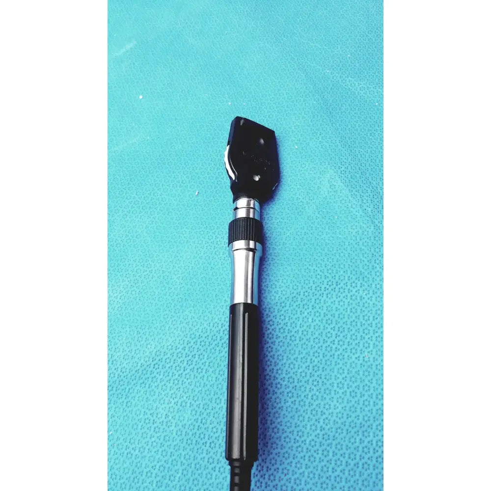 Black and silver handheld ophthalmoscope with textured grip for Welch Allyn wall transformer medical reuse