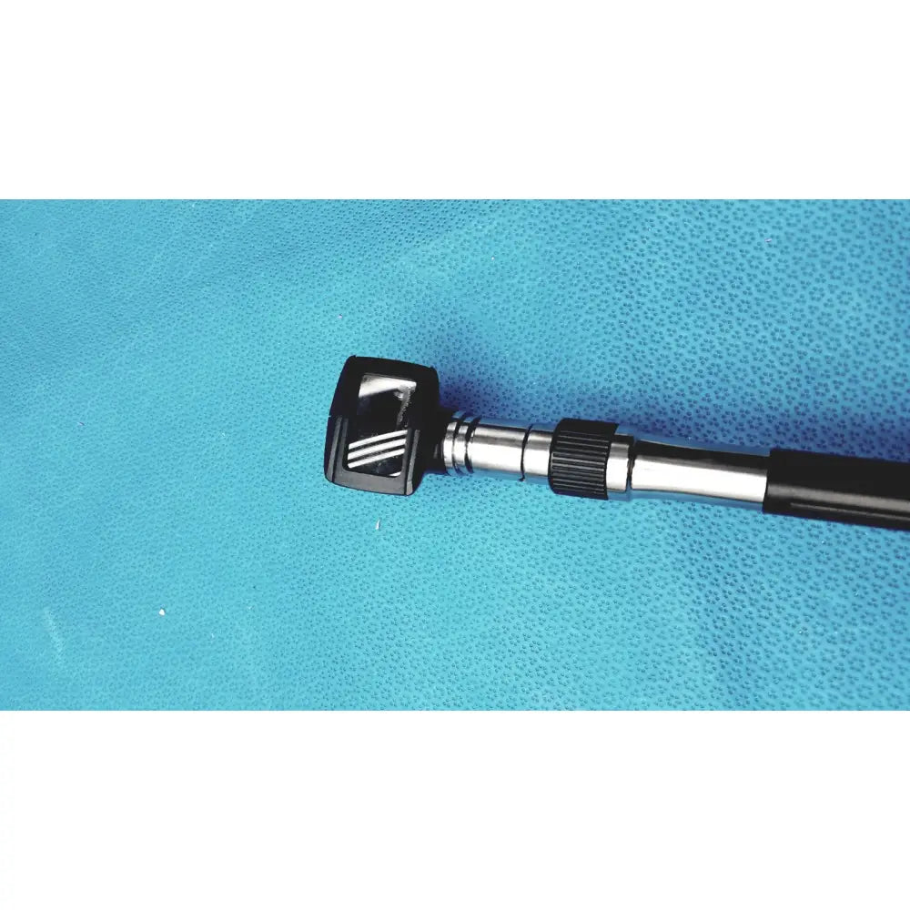 Welch allyn wall transformer with black and silver otoscope featuring a textured grip handle for reuse medical use