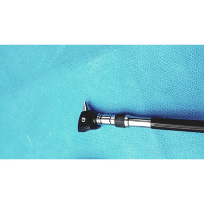 Welch allyn wall transformer with black and silver otoscope featuring a textured grip handle for reuse medical use