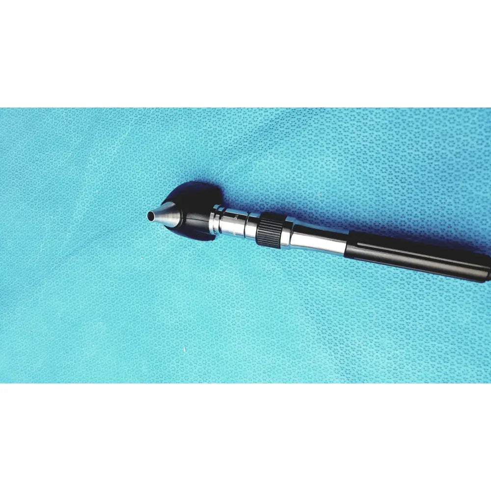 Welch allyn GS 777 wall transformer with black and silver ophthalmoscope otoscope featuring a textured grip
