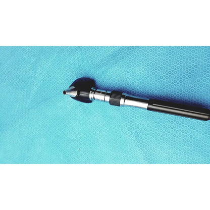Welch allyn GS 777 wall transformer with black and silver ophthalmoscope otoscope featuring a textured grip