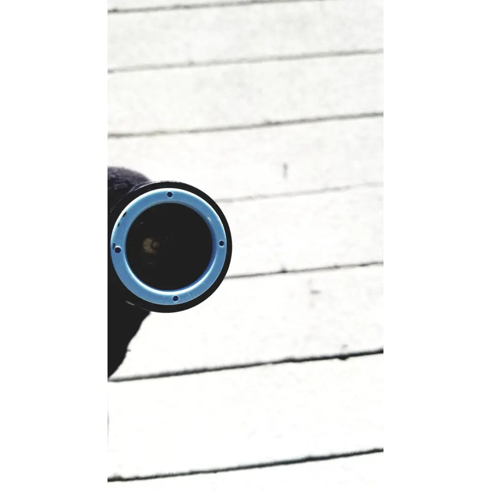 Blue and black circular camera lens of welch allyn gs exam light iv designed for reuse medical applications