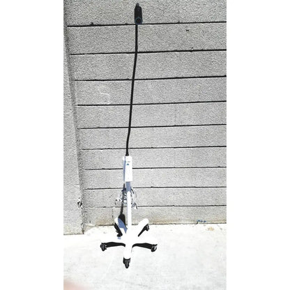 White welch allyn gs exam light with adjustable arm and black cord for medical examination lighting