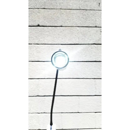 Welch Allyn GS exam light IV circular bright white LED fixture with clear glass cover and black cord for medical use