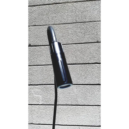 Black cylindrical welch allyn gs exam light iv with sleek modern design and textured grip for medical use