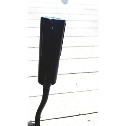 Black cylindrical welch allyn gs exam light iv with sleek modern design and curved base for efficient exam lighting