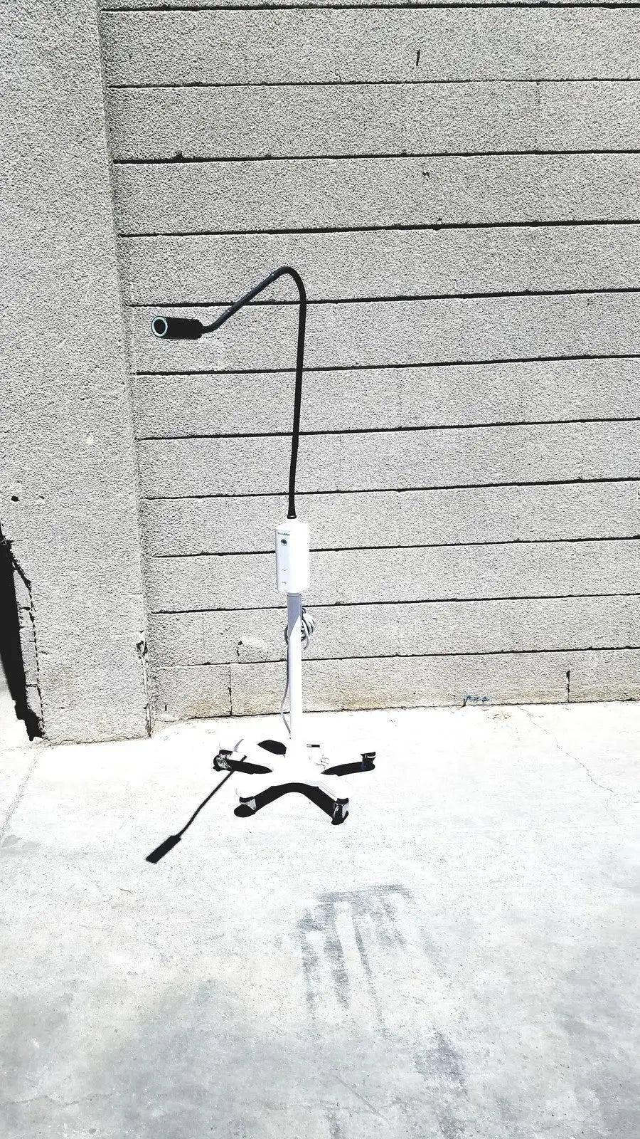 Black and white adjustable floor lamp with flexible gooseneck arm for welch allyn gs exam light use