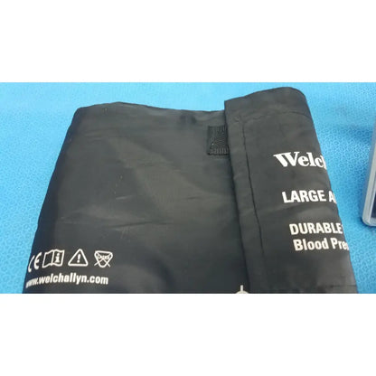 Black fabric welch allyn large adult blood pressure cuff with white branding and sizing for accuCare wall mount use