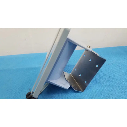 Gray and silver metal bracket with white plastic housing and mounting holes for welch allyn large adult blood pressure cuff wall mount