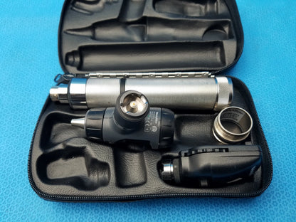 Welch allyn led macroview otoscope kit with silver and black textured metallic body, ergonomic grip, and led illumination