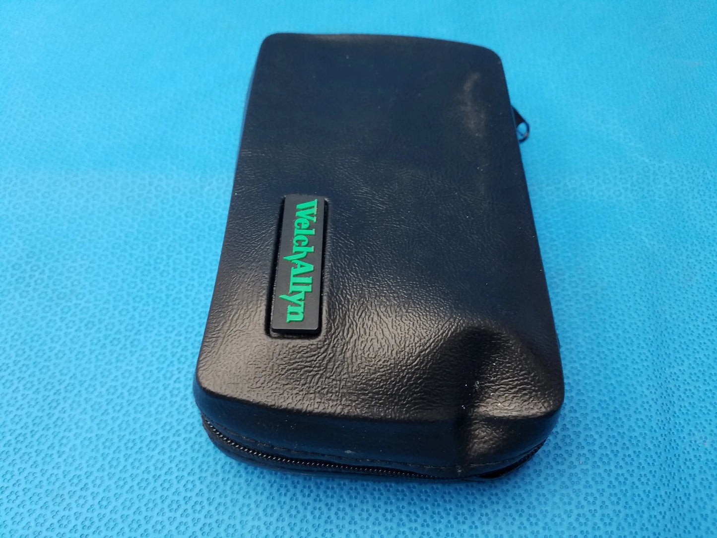Black leatherette case with green wecyalynn logo plaque for Welch Allyn LED MacroView otoscope and ophthalmoscope set with LED illumination
