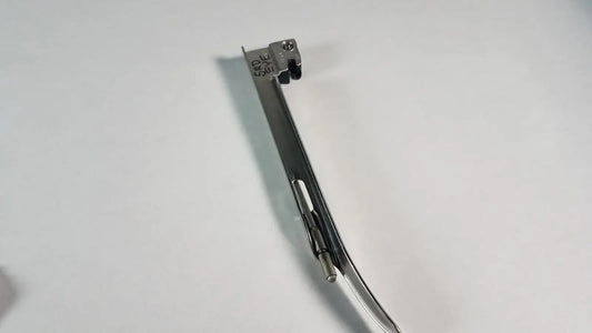 Silver surgical welch allyn miller laryngoscope blade with curved metallic handle and articulated stainless steel shaft size 3