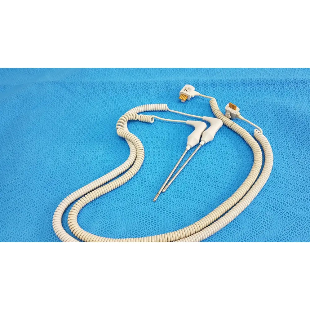White coiled welch allyn probe with metallic connectors and probes in rectal probe well kit lot of 2