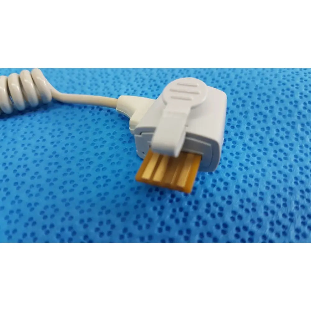 White plastic USB connector with coiled beige cable and orange contact for Welch Allyn probe well kit rectal lot of 2