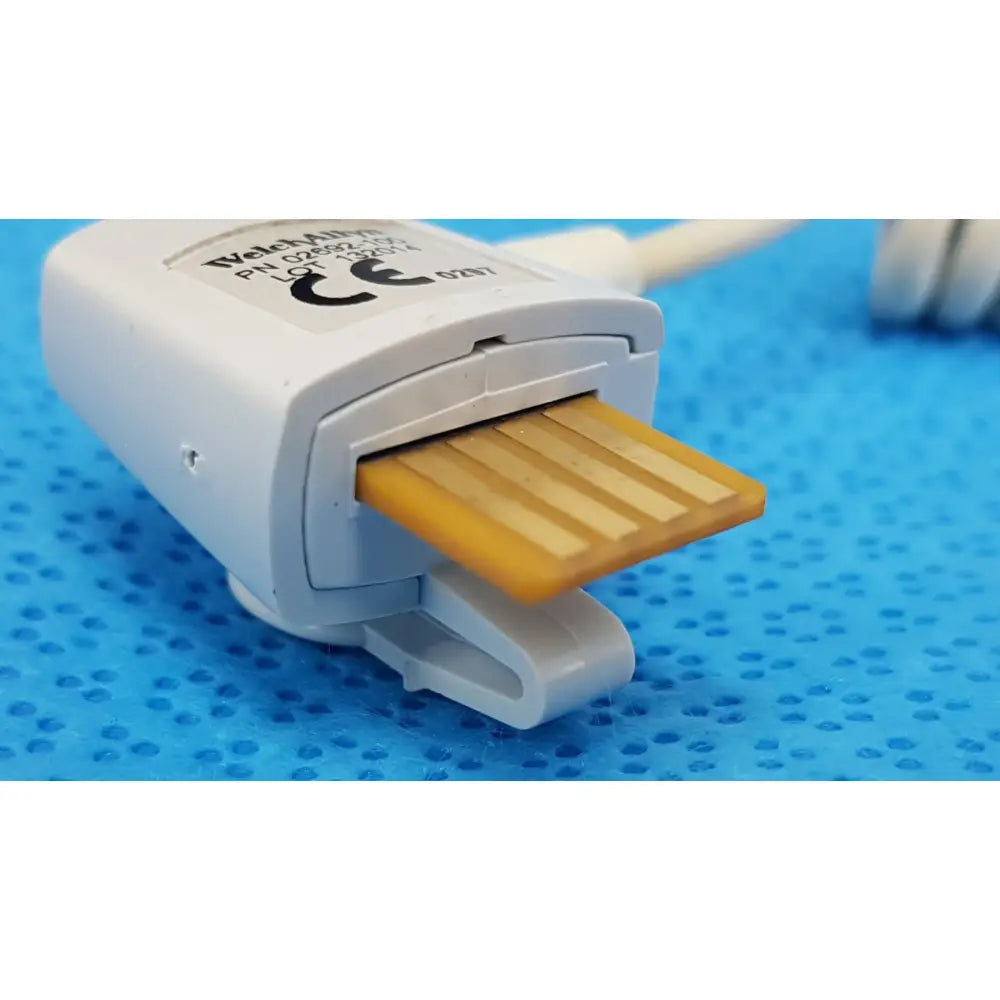 White plastic usb flash drive holder with gold microsd card inserted in welch allyn probe well kit rectal lot of 2