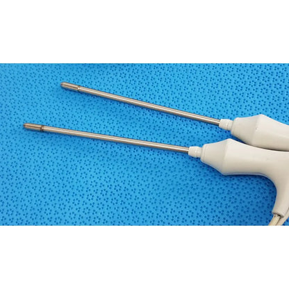 Two metallic surgical forceps with white plastic handles in welch allyn probe well kit rectal lot of 2