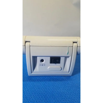 Rear view of off-white plastic desk fan with power switch and dc input port for welch allyn probp 2400 digital blood pressure device