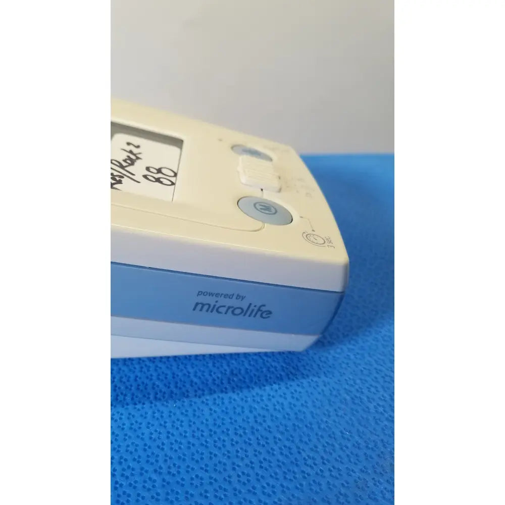 Welch allyn ProBP 2400 digital blood pressure device in cream and light blue plastic powered by Microlife