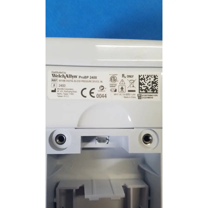 White plastic welch allyn probp 2400 digital blood pressure device showing label with model number and certification marks