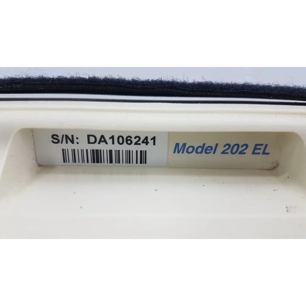 White plastic label with black barcode and blue text showing serial number and model on back of welch allyn propaq encore 202 el