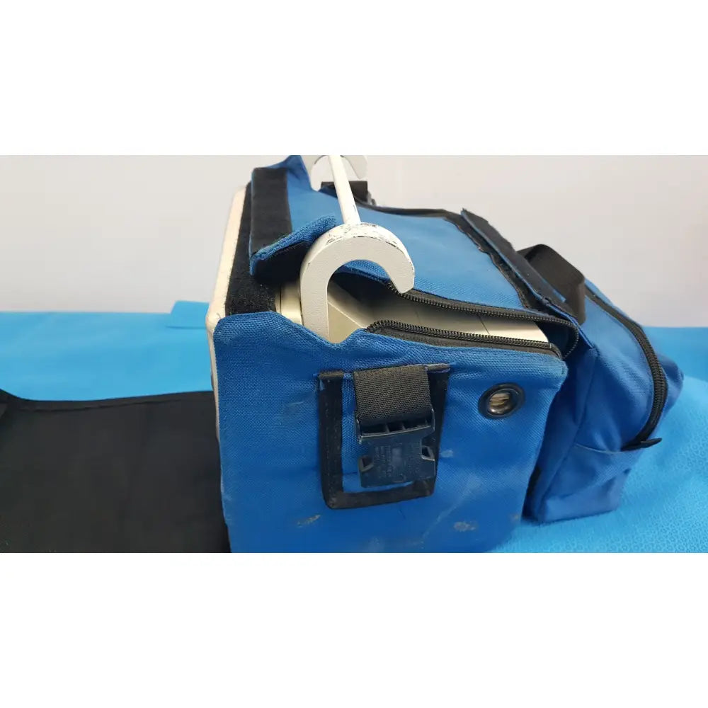 Blue fabric tool bag with black trim and white plastic hook for welch allyn propaq encore 202 el patient monitor