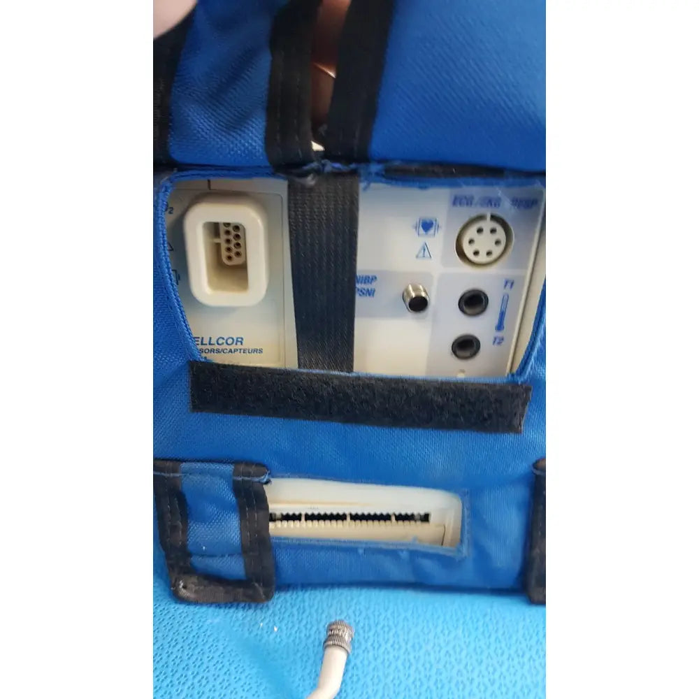 Blue fabric carrying case for welch allyn propaq encore 202 el patient monitor with white panel and ports on the back side