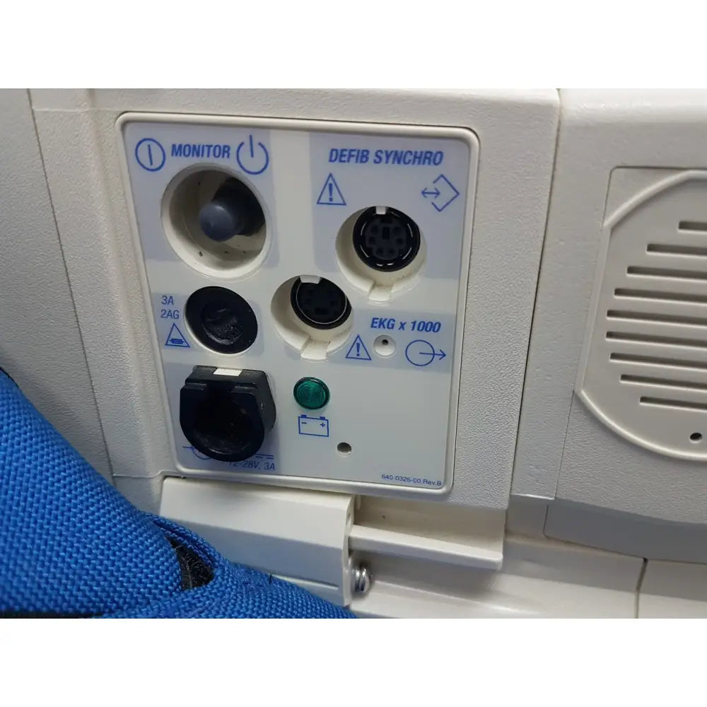 White back panel of welch allyn propaq encore patient monitor with labeled ports for ekg defibrillator and syncro functions
