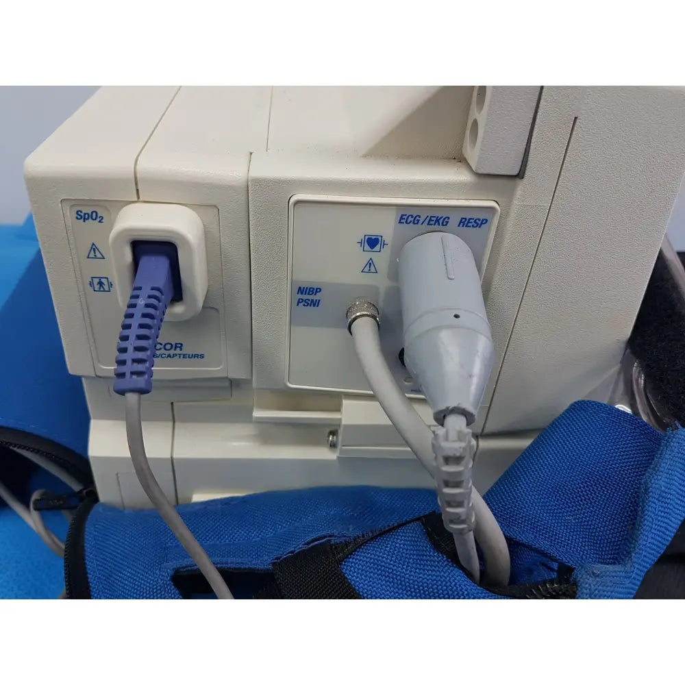 White welch allyn propaq encore patient monitor with blue and gray spo2 ecg ekg and nibp psnii connectors back view
