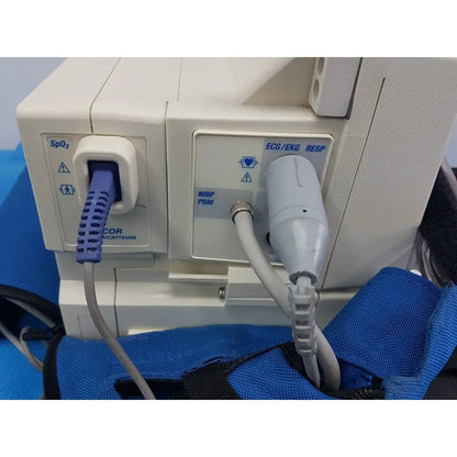 White welch allyn propaq encore patient monitor with blue and gray spo2 ecg ekg and nibp psnii connectors back view
