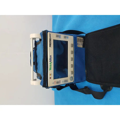 Blue and black medical device case containing a welch allyn propaq encore patient monitor for advanced monitoring