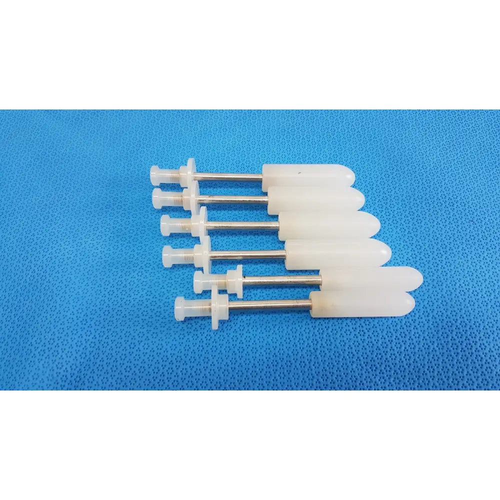 White plastic wall anchors with metallic shafts for durable welch allyn rotary filling medical fluid transfer system lot 5