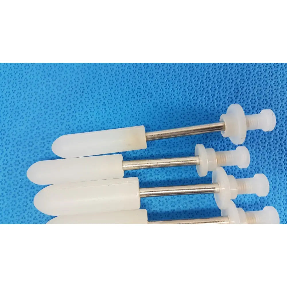 White plastic and metal wall anchors with tapered head and threaded shaft for welch allyn rotary filling pumps lot of 5