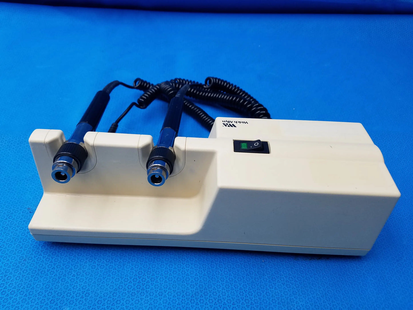 Welch allyn series transformer with two blue-handled probes and coiled black cables for allyn diagnostic use