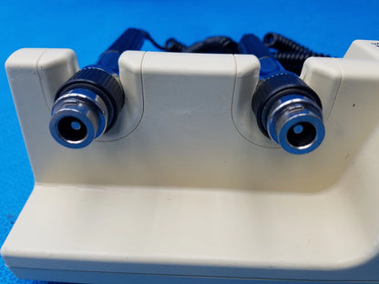 White plastic welch allyn diagnostic series transformer with two blue-tipped probes without heads for medical use