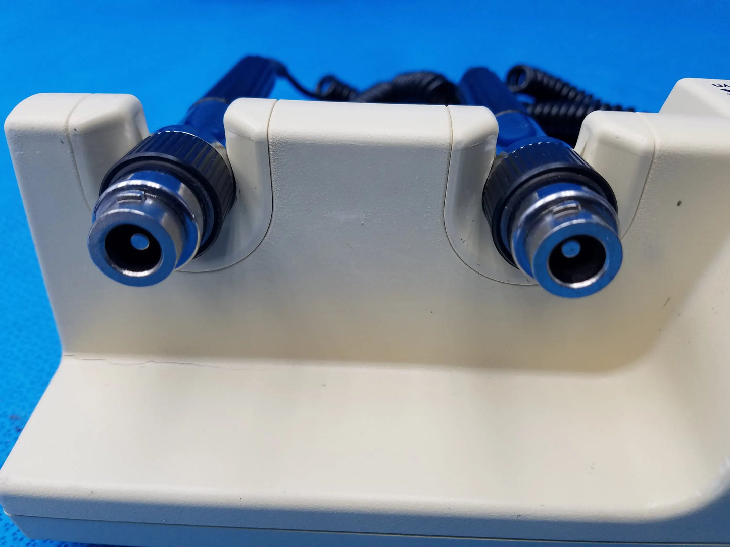 Welch allyn series transformer in blue and white with two cylindrical probes and metallic connectors for diagnostic use