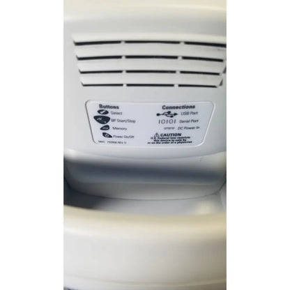 White plastic welch allyn spot vital signs lxi patient monitor back with labeled usb and serial ports and buttons