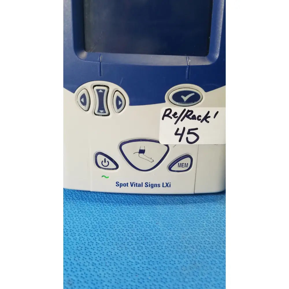 Blue and white welch allyn spot vital signs lxi medical monitor with digital screen directional buttons and memory key