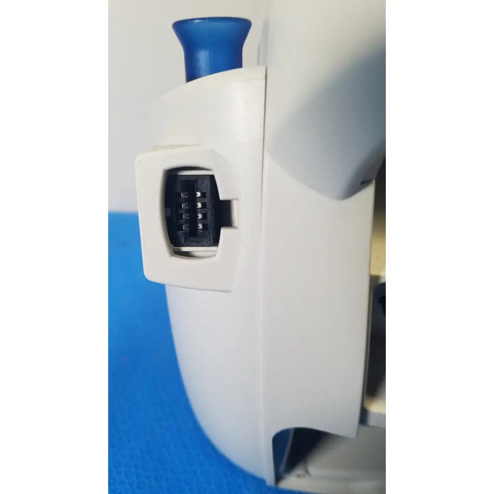White plastic pipette with blue tip and black mechanism for welch allyn spot vital signs patient monitor use
