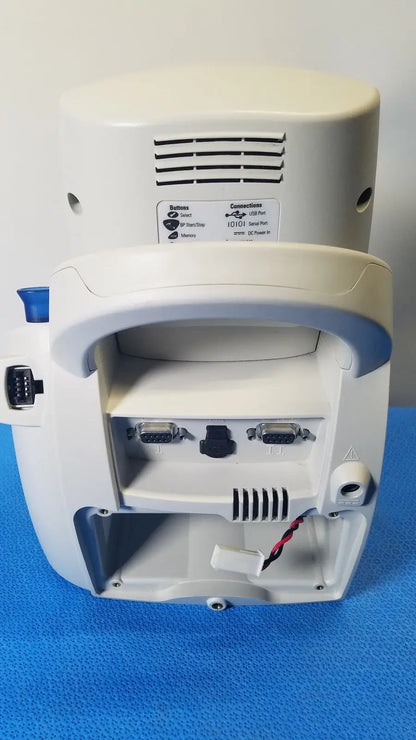 White welch allyn spot vital signs lxi patient monitor with curved handle multiple ports and button function label