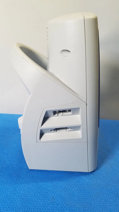 White plastic card reader with two horizontal slots for cards on the back of welch allyn spot vital signs patient monitor