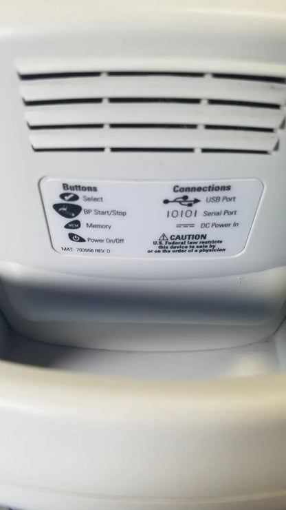 White plastic welch allyn spot vital signs lxi patient monitor back with labeled usb and serial ports and buttons