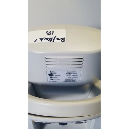Beige plastic welch allyn spot vital signs lxi device with labeled buttons and ports for medical monitoring use