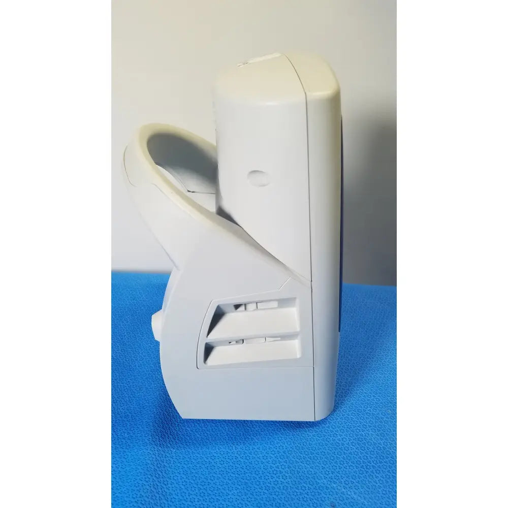 White plastic handheld welch allyn spot vital device with curved handle and vented side panel for vital signs monitoring