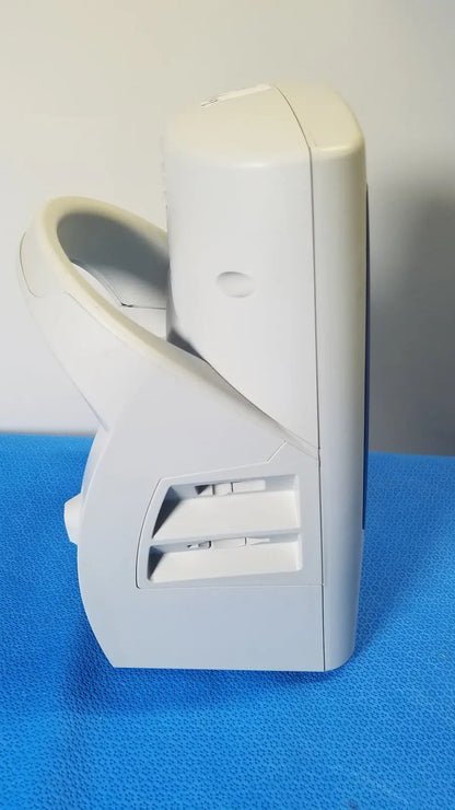 White plastic handheld welch allyn spot vital device with curved handle and vented side panel for vital signs monitoring